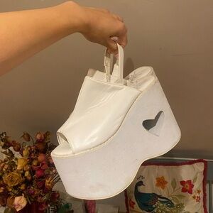 Dolls Kill White Heart Cutout Platform Shoes